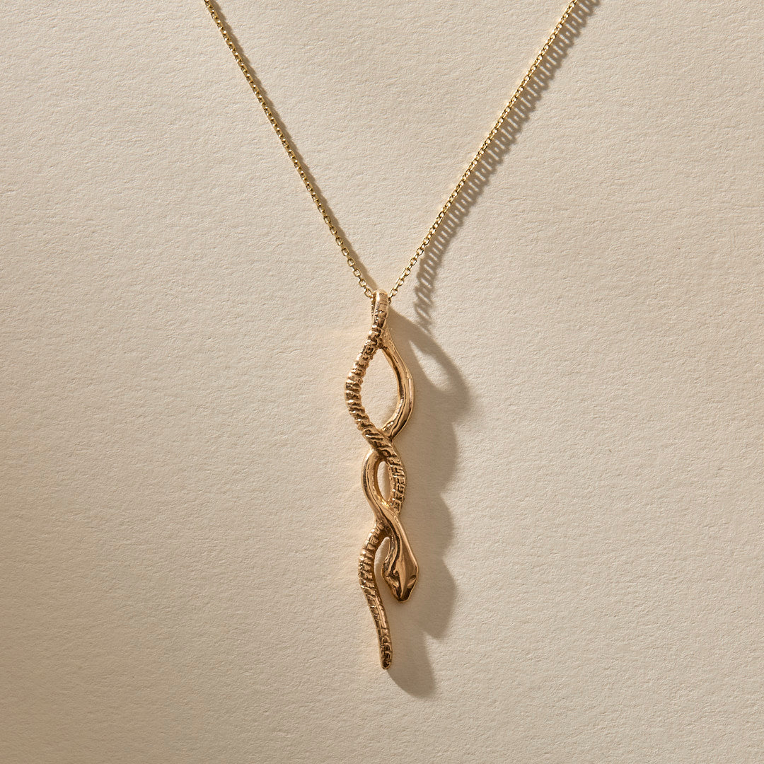 The Gold Serpent Charm Necklace