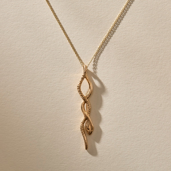 The Gold Serpent Charm Necklace