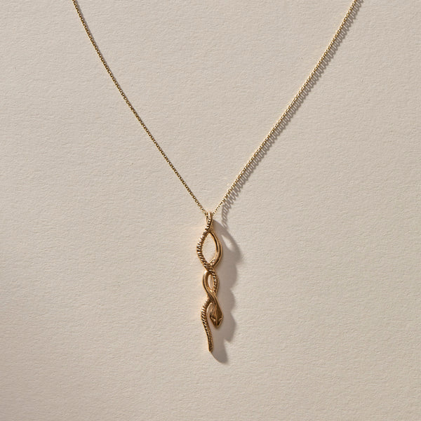 The Gold Serpent Charm Necklace