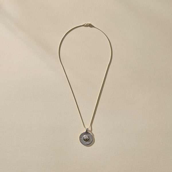 The Silver Heart of the Sun Necklace
