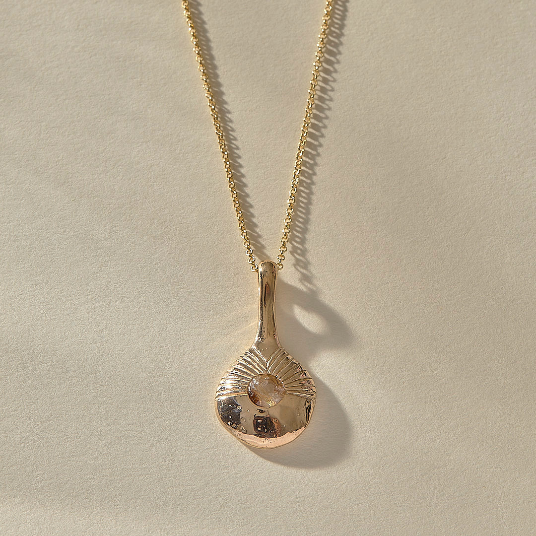 The Bronze Reflections Pendulum Necklace