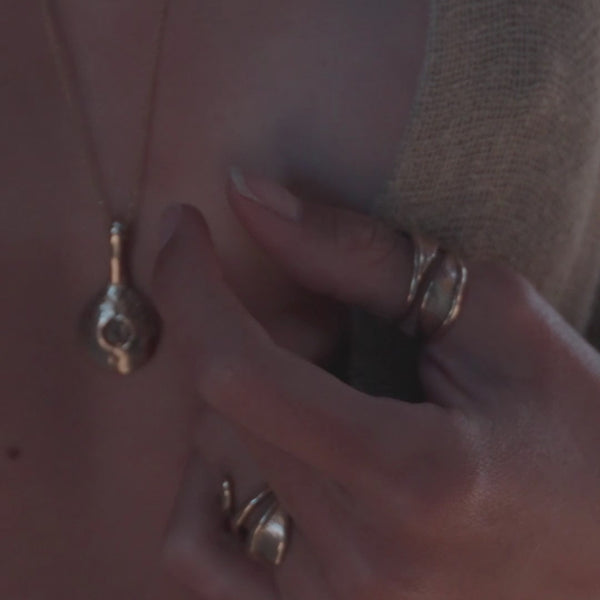 The Bronze Reflections Pendulum Necklace